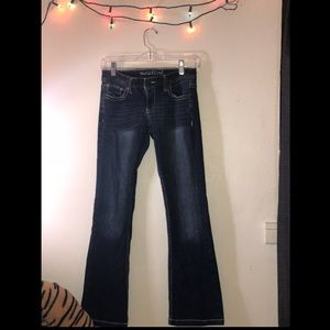 Boot cut dark blue jeans